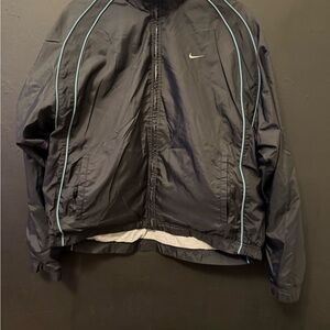 Nike Men's Black Windbreaker with Light Blue Trim